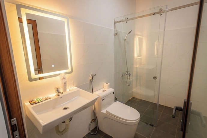 Imagen de la habitación del Hotel TAM CHAU FARM. Foto 10