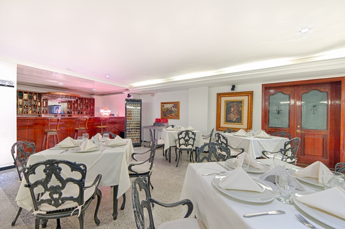 Imagen del bar/restaurante del Hotel TAMA Granada Real Cali. Foto 4