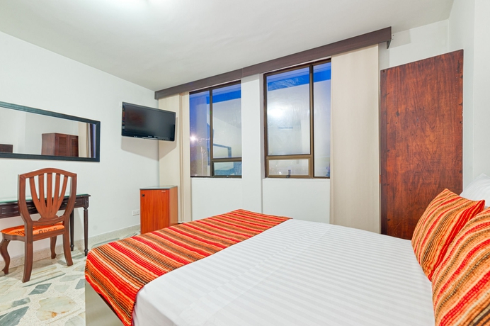 Imagen de la habitación del Hotel TAMA Granada Real Cali. Foto 11