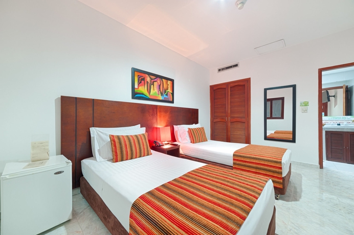 Imagen de la habitación del Hotel TAMA Granada Real Cali. Foto 13