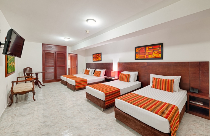 Imagen de la habitación del Hotel TAMA Granada Real Cali. Foto 15