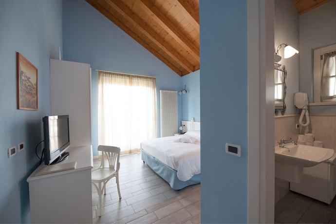 Imagen de la habitación del Hotel T\'AMI Resort SPA. Foto 17