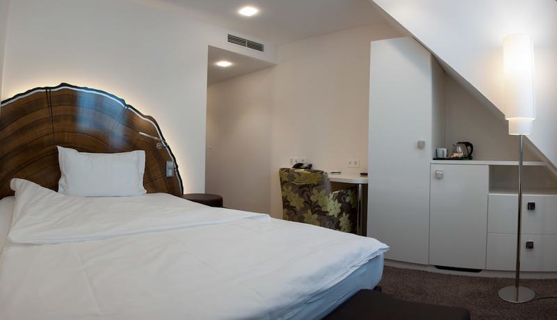 Imagen de la habitación del Hotel TAOme Feng Shui Stadthotel Breisgau. Foto 13