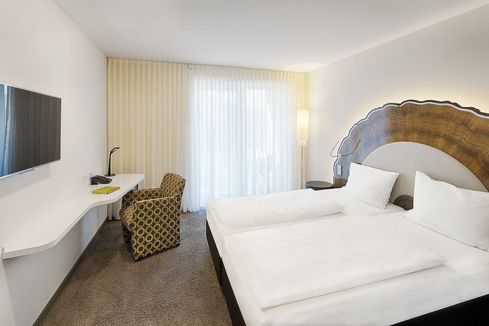 Imagen de la habitación del Hotel TAOme Feng Shui Stadthotel Breisgau. Foto 14
