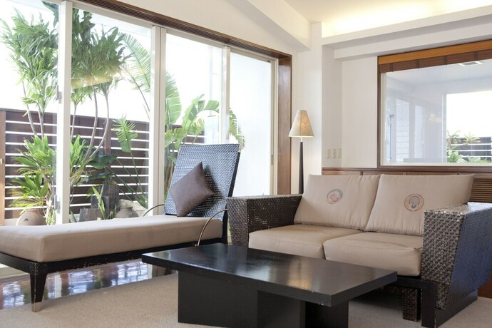 Imagen de la habitación del Hotel TATAMI NO YADO Chatan Mihama. Foto 16