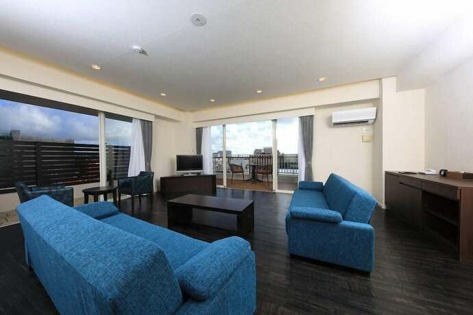 Imagen de la habitación del Hotel TATAMI NO YADO Chatan Mihama. Foto 23