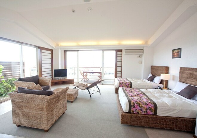 Imagen de la habitación del Hotel TATAMI NO YADO Chatan Mihama. Foto 33