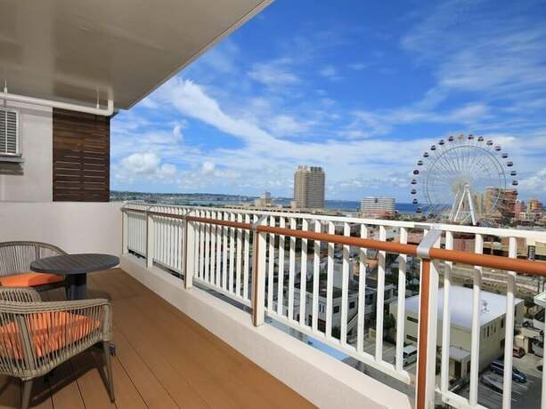 Imagen de la habitación del Hotel TATAMI NO YADO Chatan Mihama. Foto 36