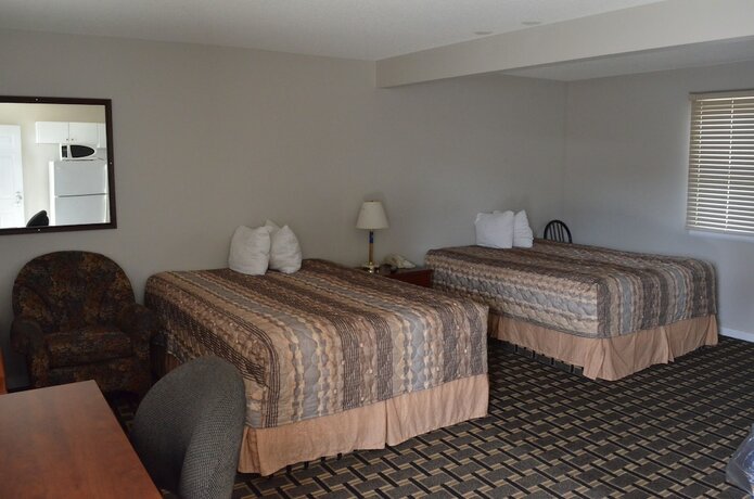 Imagen de la habitación del Hotel TC Motel. Foto 19