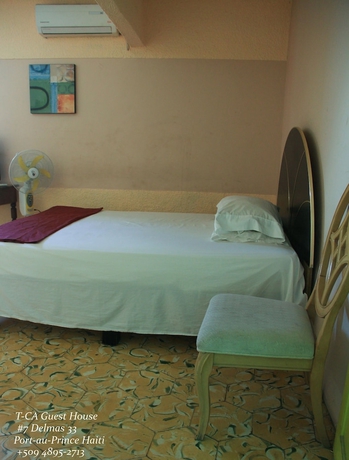 Imagen de la habitación del Hotel T-CA Guest House and Resto. Foto 9