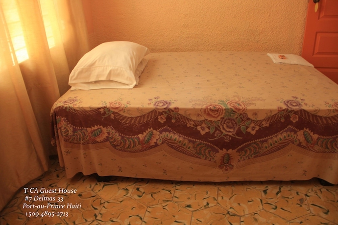 Imagen de la habitación del Hotel T-CA Guest House and Resto. Foto 10