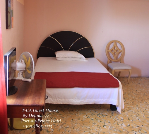 Imagen de la habitación del Hotel T-CA Guest House and Resto. Foto 11