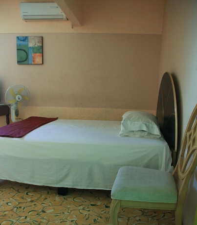 Imagen de la habitación del Hotel T-CA Guest House and Resto. Foto 13
