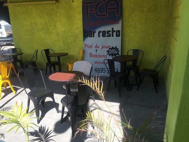 Imagen del bar/restaurante del Hotel T-CA Guest House and Resto. Foto 7