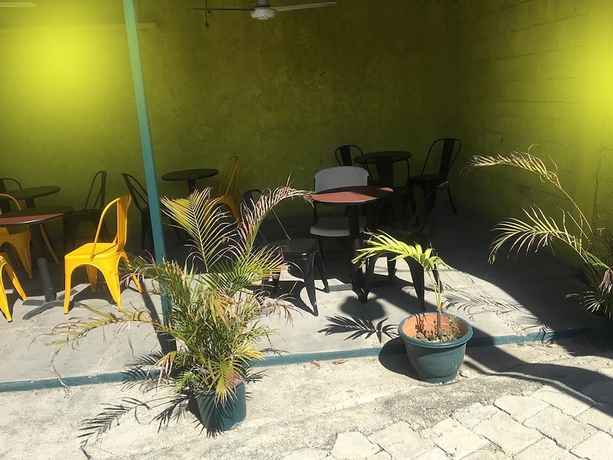 Imagen del bar/restaurante del Hotel T-CA Guest House and Resto. Foto 8