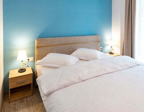 Imagen de la habitación del Hotel TCI Apartments. Foto 15