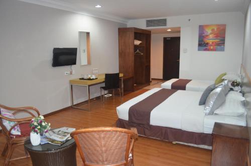 Imagen de la habitación del Hotel TD Plaza. Foto 8