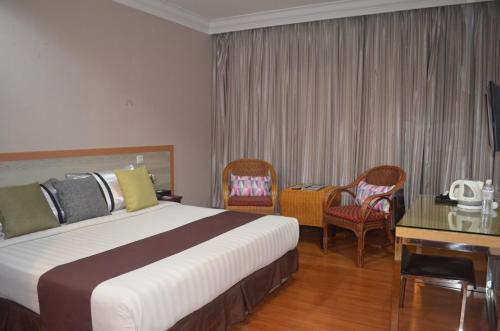 Imagen de la habitación del Hotel TD Plaza. Foto 9