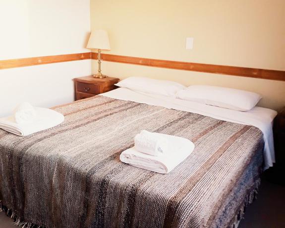Imagen de la habitación del Hotel TEHUEL PLAZA HOTEL. Foto 4