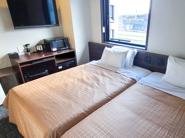 Imagen de la habitación del Hotel TENNEN-ONSEN HOTEL LiVEMAX PREMIUM Nagano-ekimae. Foto 6