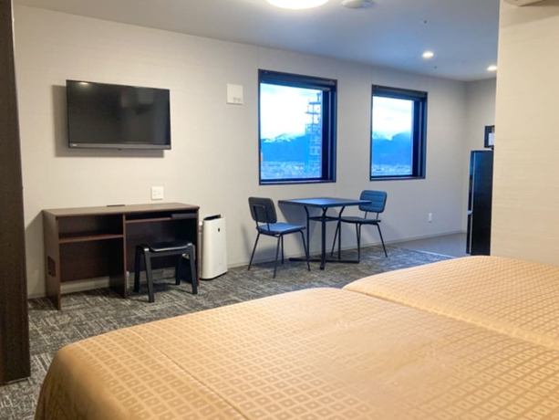 Imagen de la habitación del Hotel TENNEN-ONSEN HOTEL LiVEMAX PREMIUM Nagano-ekimae. Foto 10
