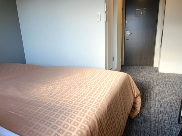 Imagen de la habitación del Hotel TENNEN-ONSEN HOTEL LiVEMAX PREMIUM Nagano-ekimae. Foto 12