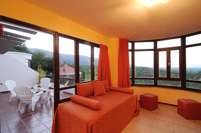 Imagen de la habitación del Hotel TERRAZAS DE MERLO APART HOTEL. Foto 3