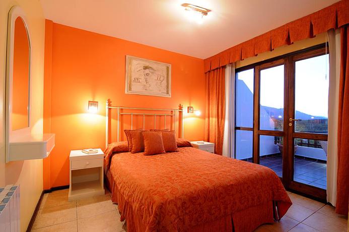 Imagen de la habitación del Hotel TERRAZAS DE MERLO APART HOTEL. Foto 4