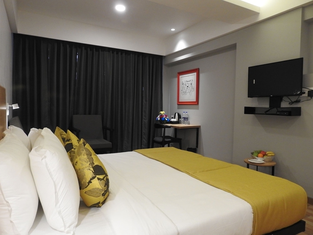 Imagen de la habitación del Hotel TGI Ameya Grand. Foto 7