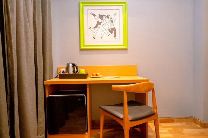 Imagen de la habitación del Hotel TGI Ameya Grand. Foto 9