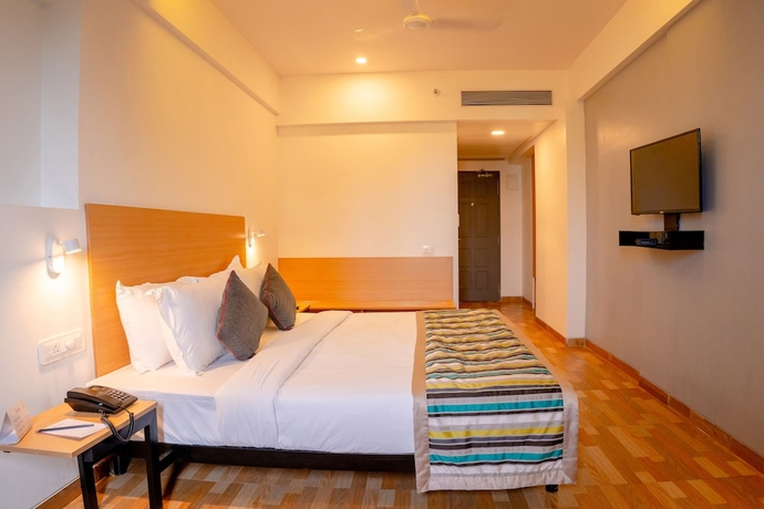 Imagen de la habitación del Hotel TGI Ameya Grand. Foto 10