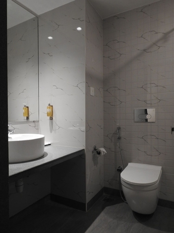 Imagen de la habitación del Hotel TGI Ameya Grand. Foto 11