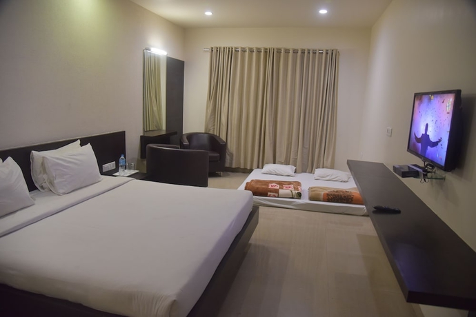 Imagen de la habitación del Hotel TGI Grand Nirvanaa. Foto 3