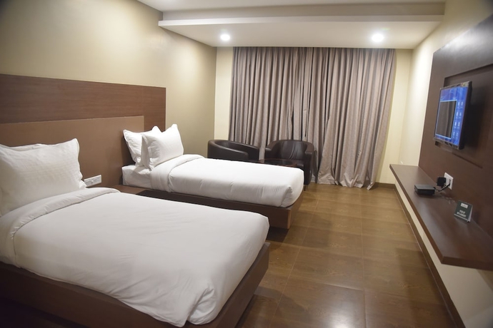 Imagen de la habitación del Hotel TGI Grand Nirvanaa. Foto 5
