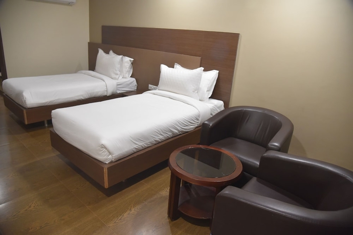 Imagen de la habitación del Hotel TGI Grand Nirvanaa. Foto 6