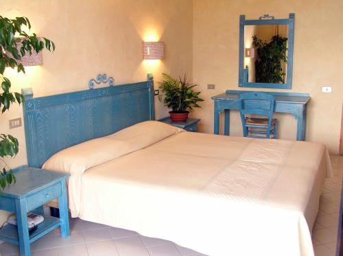 Imagen de la habitación del Hotel TH Costa Rei - Free Beach Resort. Foto 13