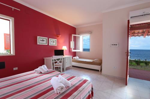 Imagen de la habitación del Hotel TH Gioiosa Mare - Capo Calav&agrave; Village. Foto 17