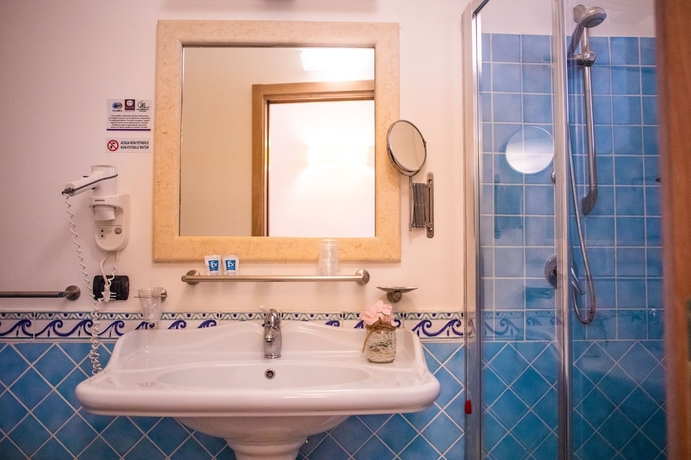 Imagen de la habitación del Hotel TH Le Castella - Baia degli Dei Village. Foto 10