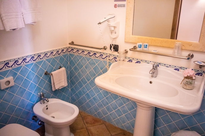 Imagen de la habitación del Hotel TH Le Castella - Baia degli Dei Village. Foto 11