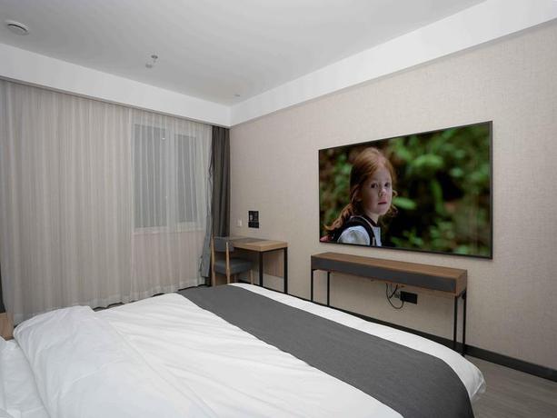 Imagen de la habitación del Hotel THANK INN PLUS HOTEL QINGDAO LICANG WAN NIANQUAN ROAD. Foto 2