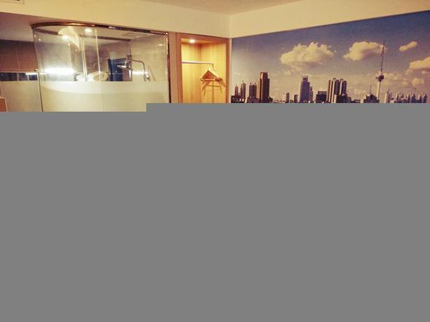 Imagen de la habitación del Hotel THANK INN PLUS HOTEL XUZHOU HUOHUA. Foto 2