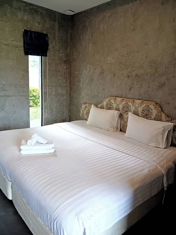 Imagen de la habitación del Hotel THE AIYARARIN RESORT. Foto 4