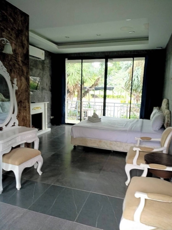 Imagen de la habitación del Hotel THE AIYARARIN RESORT. Foto 8
