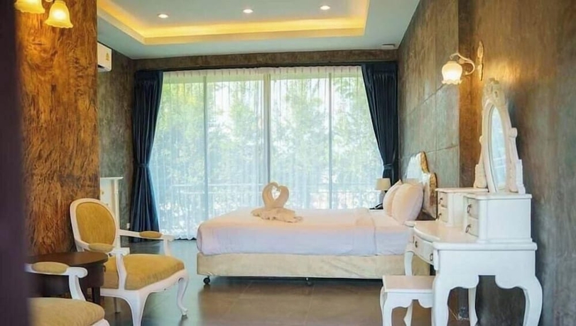 Imagen de la habitación del Hotel THE AIYARARIN RESORT. Foto 10