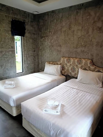 Imagen de la habitación del Hotel THE AIYARARIN RESORT. Foto 12