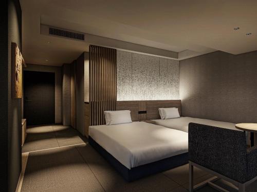 Imagen de la habitación del Hotel THE BLOSSOM KYOTO. Foto 8