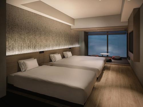 Imagen de la habitación del Hotel THE BLOSSOM KYOTO. Foto 10