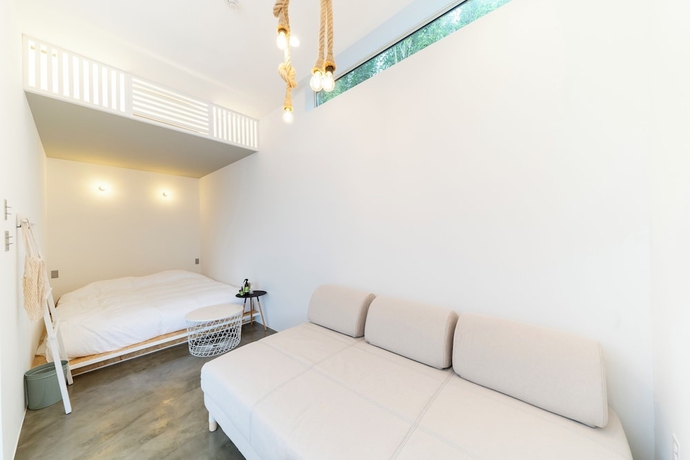 Imagen de la habitación del Hotel THE CHIKURA UMI BASE CAMP. Foto 12