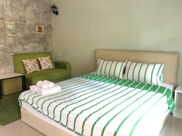 Imagen de la habitación del Hotel THE COLOR RESORT AMPHAWA. Foto 8