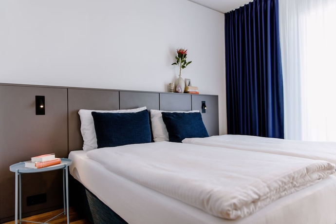 Imagen de la habitación del Hotel THE FLAG Meiller G&auml;rten. Foto 2